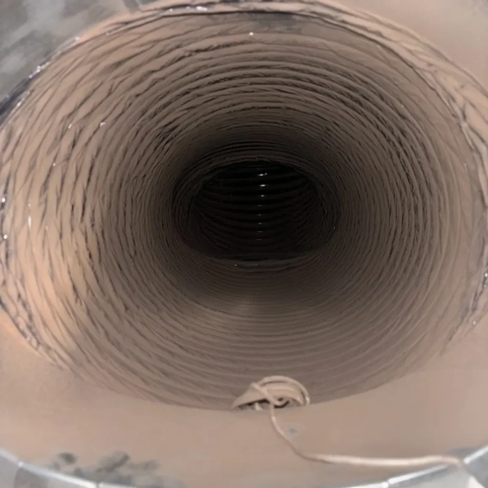 Looking down the inside of a flexible duct run